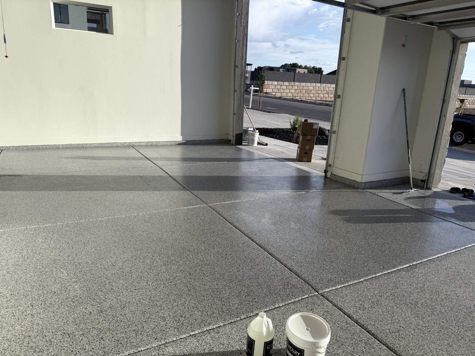 Wide residential garage with flake coating