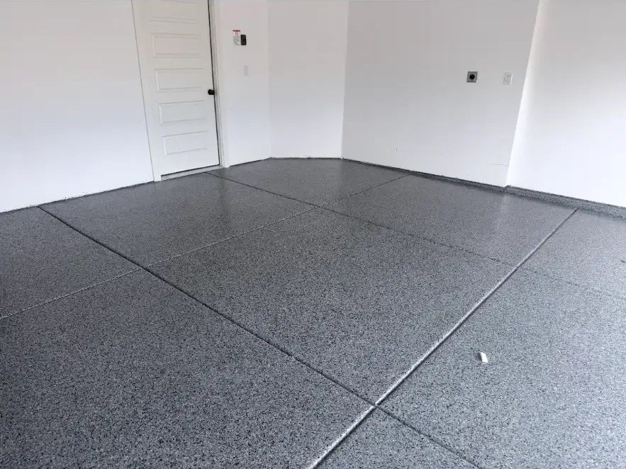 Finished flake floor in a bright white garage