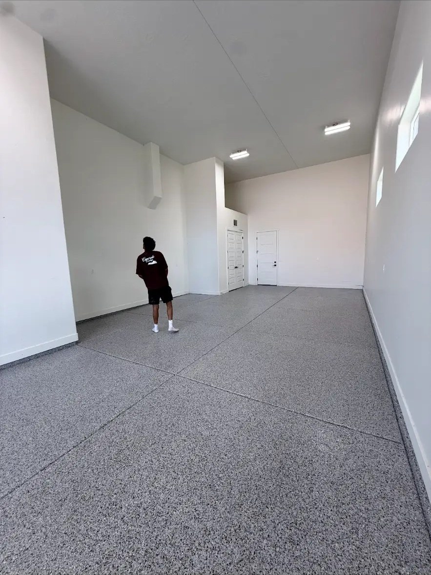 Large flake coated garage with tall ceilings