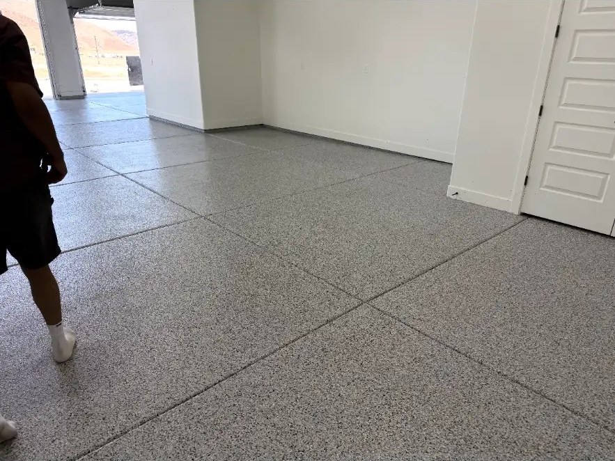 Wide finished flake floor in a bright garage